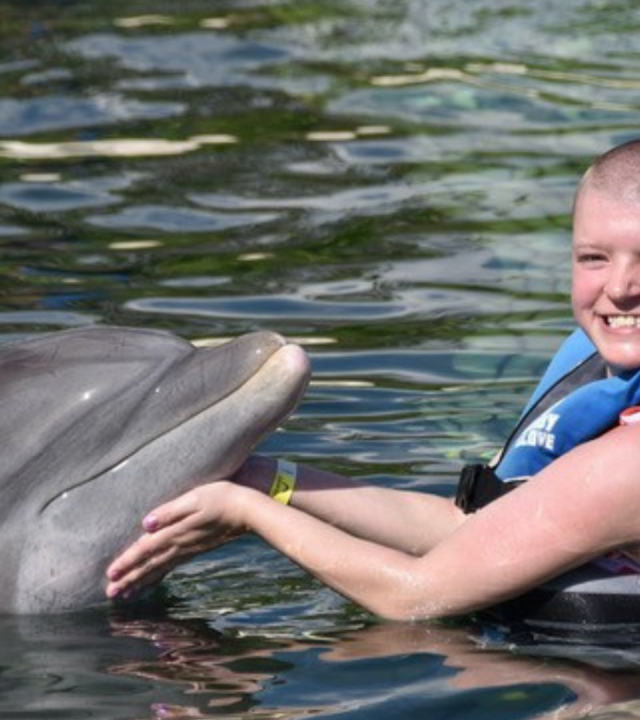 Grace with a dolphin
